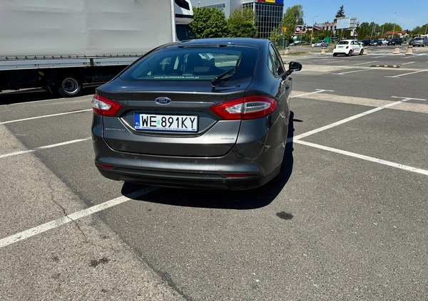 Ford Mondeo cena 42500 przebieg: 180389, rok produkcji 2015 z Warszawa małe 106